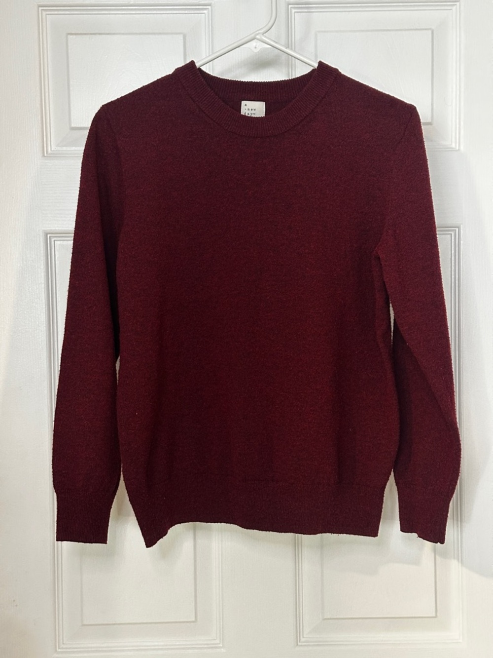 a new day Women’s Crewneck Sweater in Burgundy. Size Medium.
